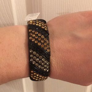 Brand new! Black and gold stretch bangle